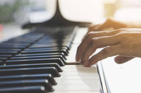 hands of a piano playing guy in a sensitive mood